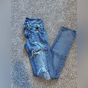 AEO Women's Ripped Blue Skinny Jeans